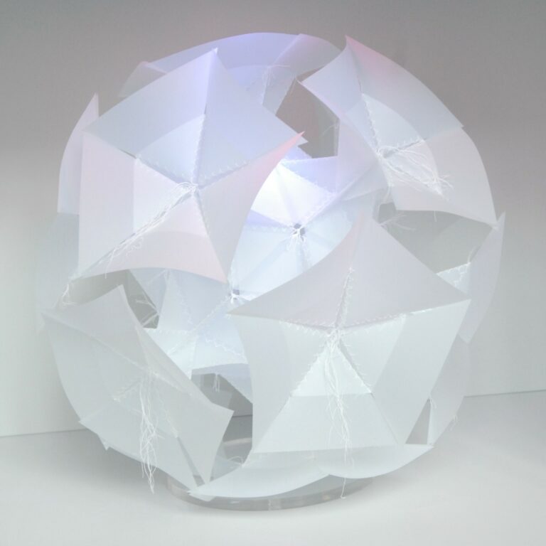Stitched globe sculpture inspired by botanic forms